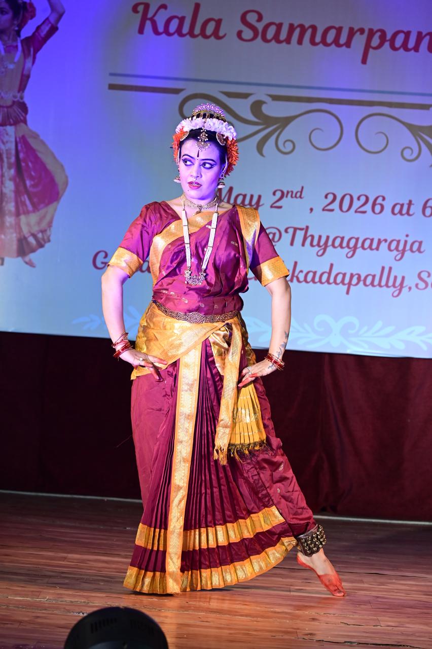Classical dancer in maroon costume